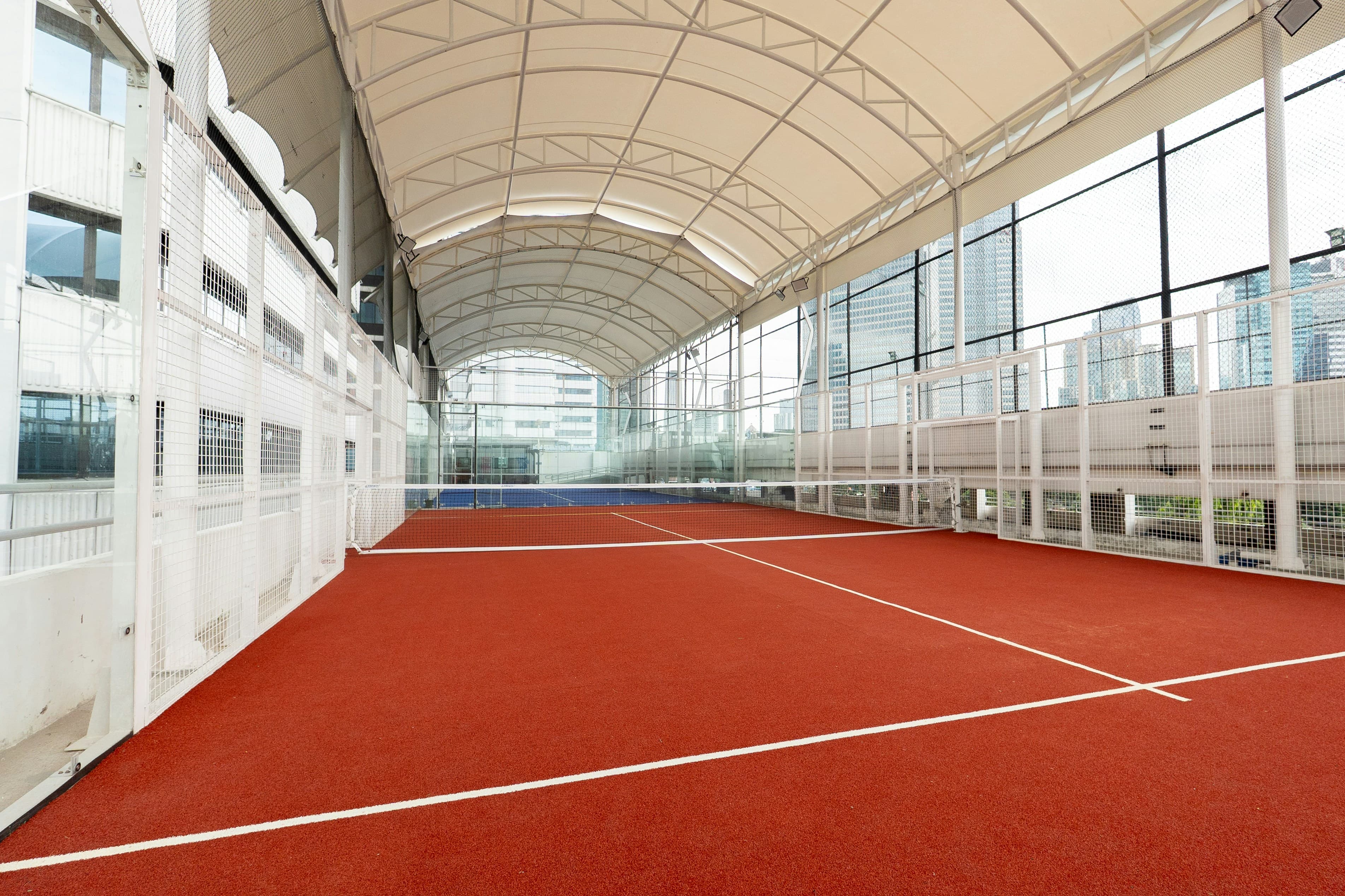 Padel players on court